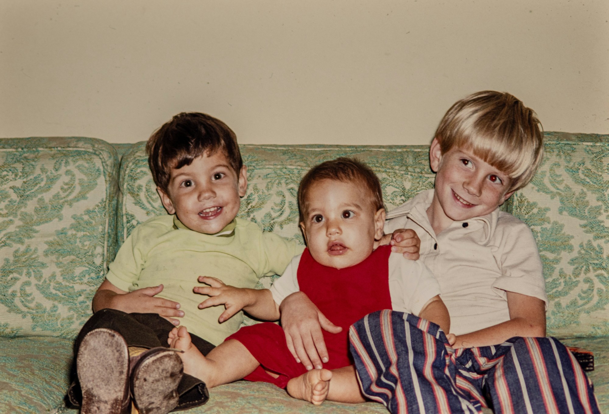 Three kids on a couch