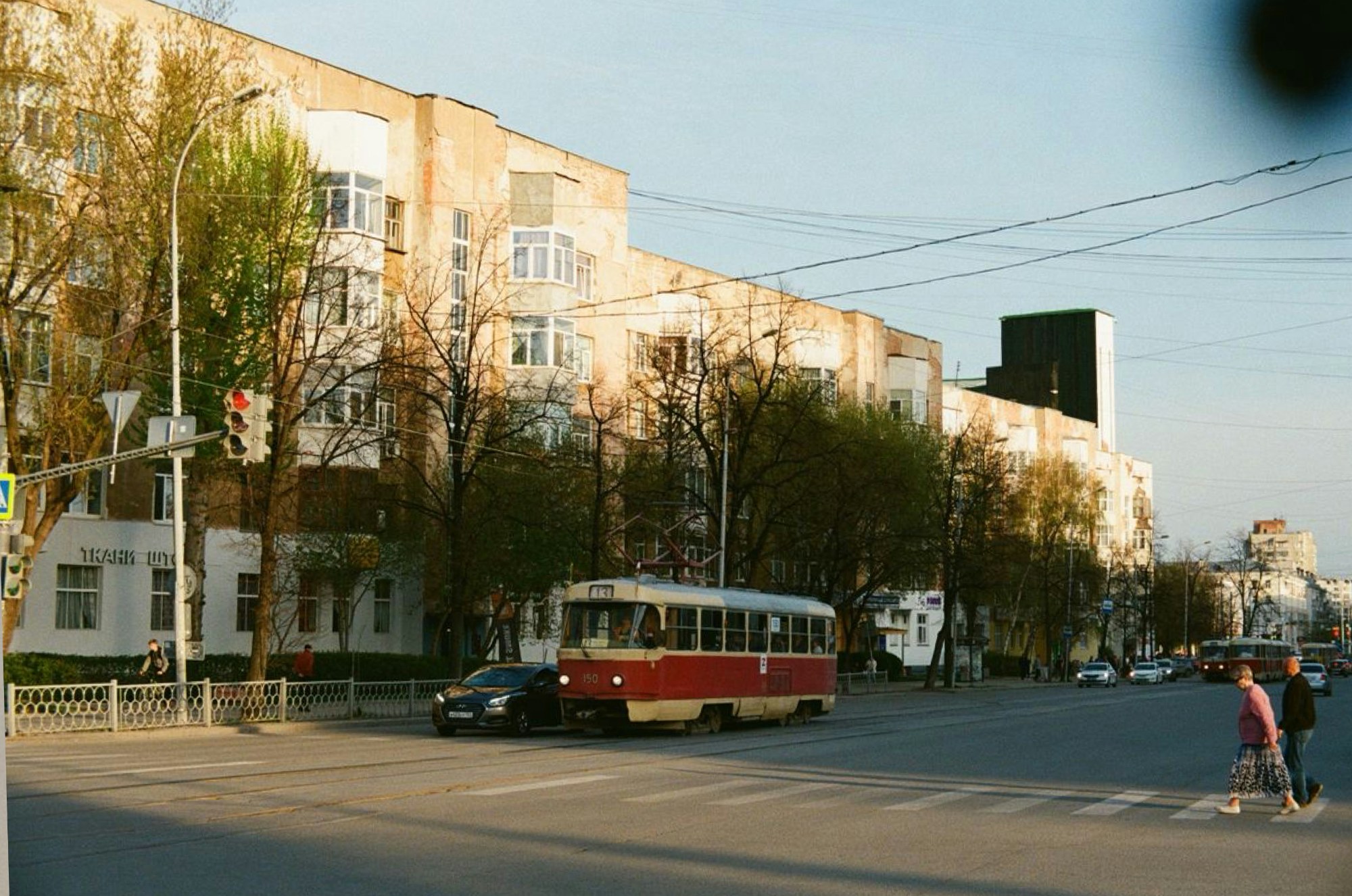 A tram on a sunlit street
